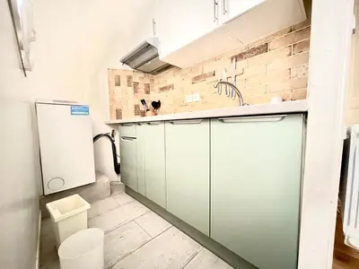 Cuisine ou kitchenette dans l'établissement The 6th district Paris Historical apartment near Montparnasse