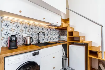 Cuisine ou kitchenette dans l'établissement GuestReady - Bel Appartement Le Marais