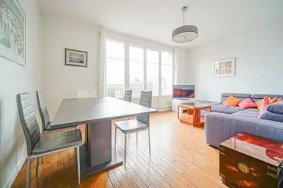 Coin salon dans l'établissement Appartement familiale #Wagram #Pereire - II