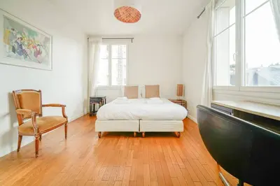 Un ou plusieurs lits dans un hébergement de l'établissement Appartement familiale #Wagram #Pereire - II