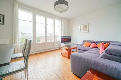 Coin salon dans l'établissement Appartement familiale #Wagram #Pereire - II