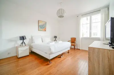 Un ou plusieurs lits dans un hébergement de l'établissement Appartement familiale #Wagram #Pereire - II