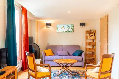 Coin salon dans l'établissement GuestReady - Comfortable getaway near Paris