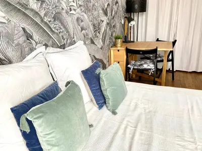 Un ou plusieurs lits dans un hébergement de l'établissement Cozy studio near Montmartre