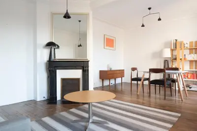 Coin salon dans l'établissement Bright and charming apartment