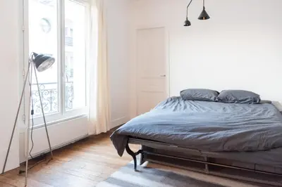 Un ou plusieurs lits dans un hébergement de l'établissement Bright and charming apartment