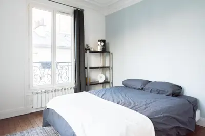 Un ou plusieurs lits dans un hébergement de l'établissement Bright and charming apartment