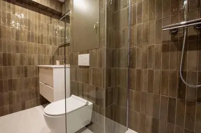 Salle de bains dans l'établissement Sentier Historical Center II Luxury Design Apartment 3BR-8P