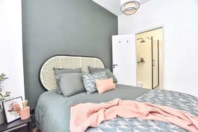 Un ou plusieurs lits dans un hébergement de l'établissement Charming Flat in Montmartre - Imhost