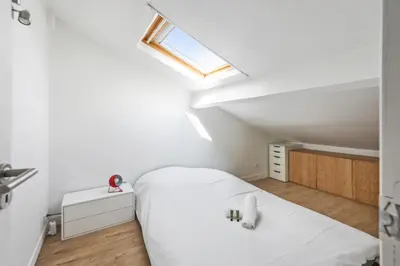 Un ou plusieurs lits dans un hébergement de l'établissement Appartement Heinrich - Welkeys