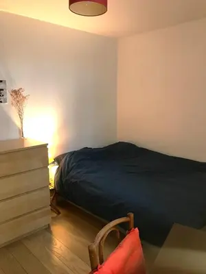 Un ou plusieurs lits dans un hébergement de l'établissement Superbe maison individuelle dans Paris