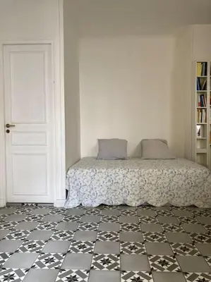 Un ou plusieurs lits dans un hébergement de l'établissement Elegant flat in the historic center of Paris