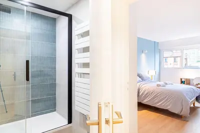 Un ou plusieurs lits dans un hébergement de l'établissement GuestReady - Apt avec Balcon à la Place d'Italie