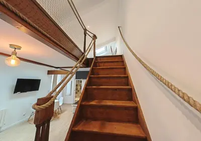 Télévision ou salle de divertissement dans l'établissement Loft Duplex à 2 min de Paris - Parking gratuit