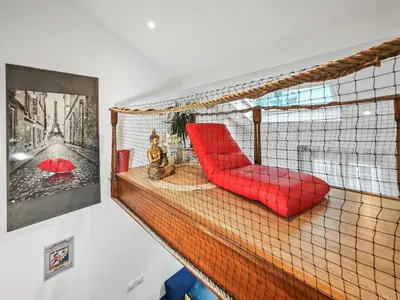 Coin salon dans l'établissement Loft Duplex à 2 min de Paris - Parking gratuit