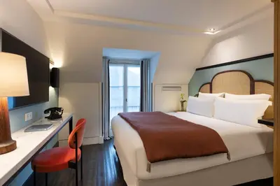 Un ou plusieurs lits dans un hébergement de l'établissement The Chess Hotel