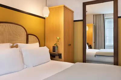 Un ou plusieurs lits dans un hébergement de l'établissement The Chess Hotel