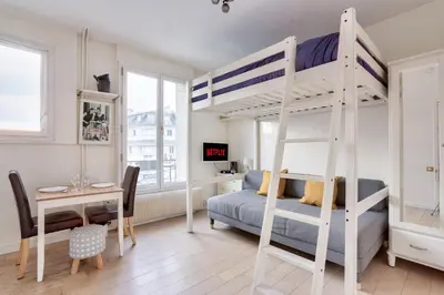 Un ou plusieurs lits dans un hébergement de l'établissement Studio - Appartement Quartier Tour Eiffel 3 Free Netflix