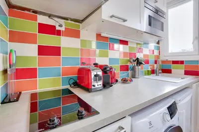 Cuisine ou kitchenette dans l'établissement Studio - Appartement Quartier Tour Eiffel 3 Free Netflix