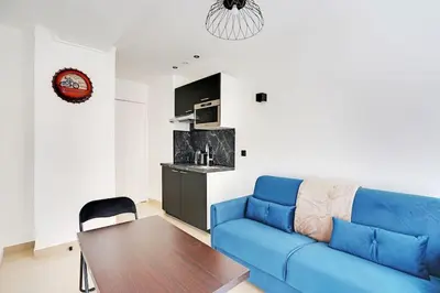 Cuisine ou kitchenette dans l'établissement Appartement - Paris