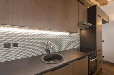 Cuisine ou kitchenette dans l'établissement Contrevents