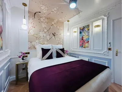 Un ou plusieurs lits dans un hébergement de l'établissement Merveil - Luxury Suite - Marais - Charlot