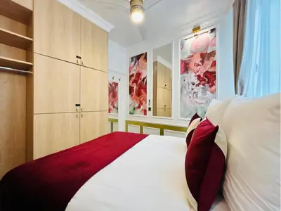 Un ou plusieurs lits dans un hébergement de l'établissement Merveil - Luxury Suite - Marais - Charlot