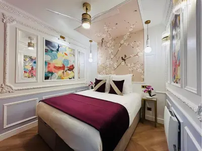 Un ou plusieurs lits dans un hébergement de l'établissement Merveil - Luxury Suite - Marais - Charlot