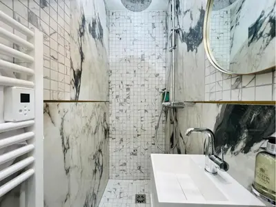 Salle de bains dans l'établissement Merveil - Luxury Suite - Marais - Charlot