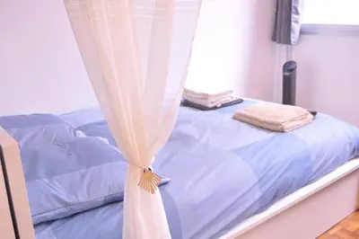Un ou plusieurs lits dans un hébergement de l'établissement Javelot1 Cosy studio paris13 10min to Louvre