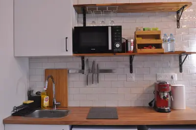 Cuisine ou kitchenette dans l'établissement Javelot1 Cosy studio paris13 10min to Louvre