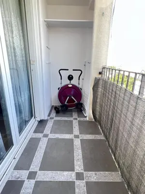 Coin salon dans l'établissement Bel appartement proche Paris métro 4