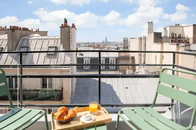 Balcon ou terrasse dans l'établissement Helussi Hôtel