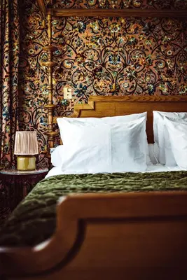 Un ou plusieurs lits dans un hébergement de l'établissement Hôtel Eldorado Paris