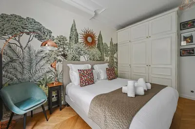 Un ou plusieurs lits dans un hébergement de l'établissement La Maison Kléber - Luxury apartments, Eiffel Tower - Champs-Elysées