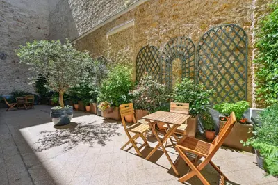 Jardin de l'établissement La Maison Kléber - Luxury apartments, Eiffel Tower - Champs-Elysées