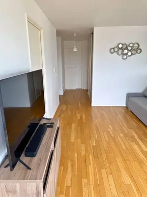 Télévision ou salle de divertissement dans l'établissement Magnifique Appart. spacieux 8P/ Défense-Courbevoie