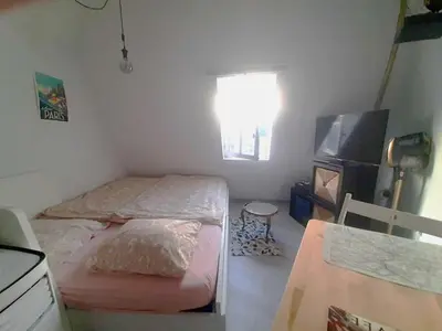 Un ou plusieurs lits dans un hébergement de l'établissement Paris Dream Apart Nord