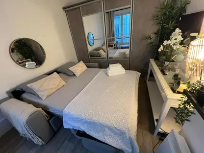 Un ou plusieurs lits dans un hébergement de l'établissement Studio moderne au cœur de Paris Batignolles
