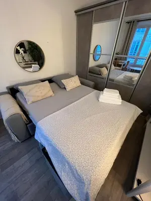 Un ou plusieurs lits dans un hébergement de l'établissement Studio moderne au cœur de Paris Batignolles