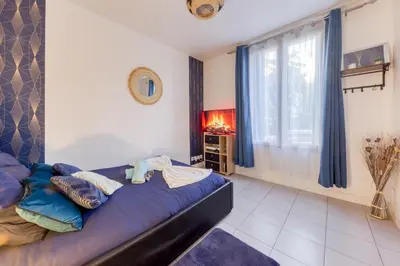 Un ou plusieurs lits dans un hébergement de l'établissement Appartement Moderne, proche Porte de Versailles et Gare de Clamart
