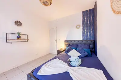 Un ou plusieurs lits dans un hébergement de l'établissement Appartement Moderne, proche Porte de Versailles et Gare de Clamart
