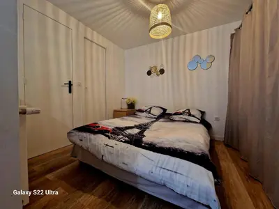 Un ou plusieurs lits dans un hébergement de l'établissement Charment studio proche Paris 15