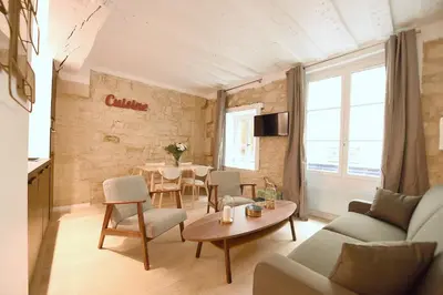 Coin salon dans l'établissement Cosy flat - Saint germain