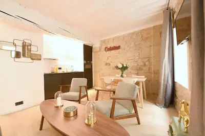 Coin salon dans l'établissement Cosy flat - Saint germain