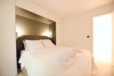Un ou plusieurs lits dans un hébergement de l'établissement Cosy flat - Saint germain