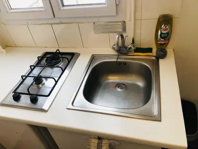 Cuisine ou kitchenette dans l'établissement Bellicime