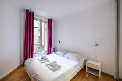 Un ou plusieurs lits dans un hébergement de l'établissement Goujon - Cozy apartment in Nation-Picpus neighborhood