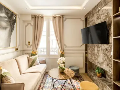 Télévision ou salle de divertissement dans l'établissement Merveil - Luxury Suite - Notre Dame - Monge