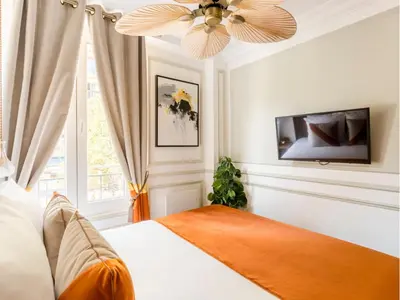 Un ou plusieurs lits dans un hébergement de l'établissement Merveil - Luxury Suite - Notre Dame - Monge